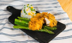 breaded fish breaded fish with rice and vegetables restaurant