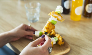 Coated chicken as finger food