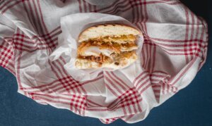 Burger with breaded fish Fish burger with sprouts