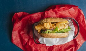 Fish burger with a crispy coating Fish burger with sauerkraut