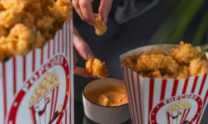 Chicken popcorn consists of small, irregular bite-sized pieces of chicken