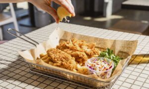 Breaded Fish Pieces with Sides Fish nuggets on your restaurant menu